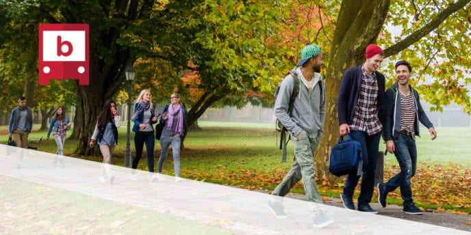 students on a college campus in autumn